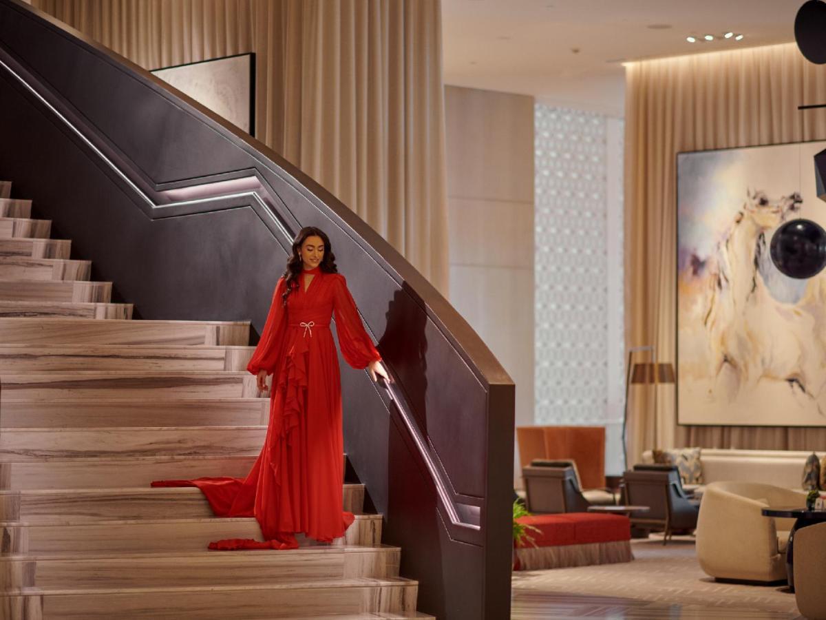 Grand Hyatt Kuwait Hotel Kuwait City Luaran gambar A model in a red dress